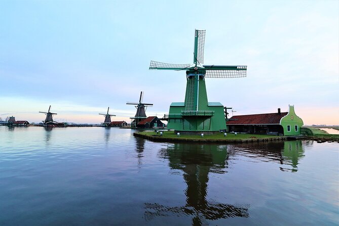 Green-painted windmills along the River Zaan at the Zaanse Schans